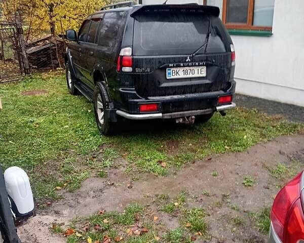 Чорний Міцубісі Паджеро Спорт, об'ємом двигуна 2.97 л та пробігом 230 тис. км за 9500 $, фото 3 на Automoto.ua