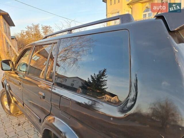 Чорний Міцубісі Паджеро Спорт, об'ємом двигуна 3 л та пробігом 417 тис. км за 6500 $, фото 23 на Automoto.ua