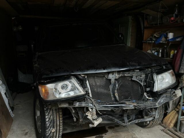 Черный Мицубиси Паджеро Спорт, объемом двигателя 3 л и пробегом 390 тыс. км за 3000 $, фото 1 на Automoto.ua