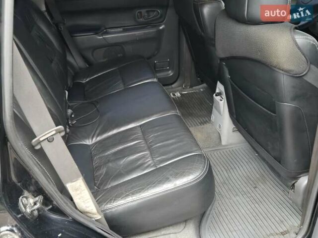 Чорний Міцубісі Паджеро Спорт, об'ємом двигуна 2.5 л та пробігом 345 тис. км за 9900 $, фото 12 на Automoto.ua