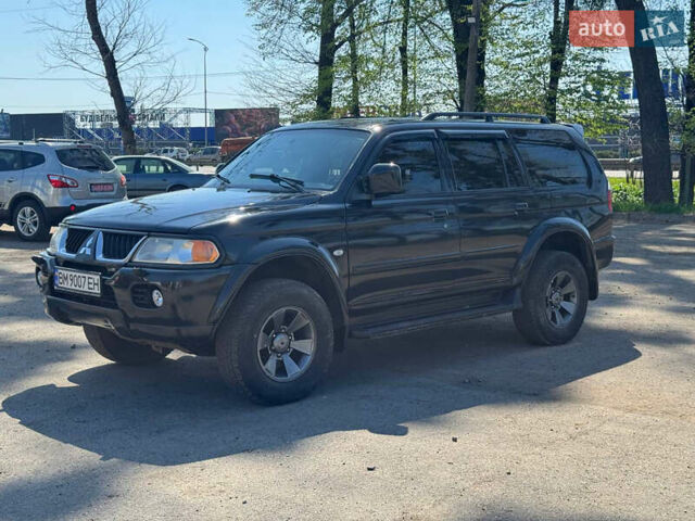 Чорний Міцубісі Паджеро Спорт, об'ємом двигуна 3 л та пробігом 195 тис. км за 8500 $, фото 4 на Automoto.ua
