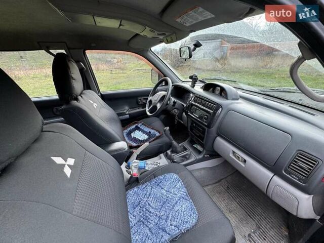 Черный Мицубиси Паджеро Спорт, объемом двигателя 3 л и пробегом 180 тыс. км за 8600 $, фото 8 на Automoto.ua