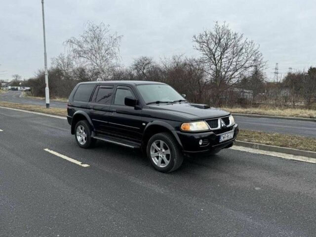 Чорний Міцубісі Паджеро Спорт, об'ємом двигуна 2.5 л та пробігом 248 тис. км за 4100 $, фото 1 на Automoto.ua