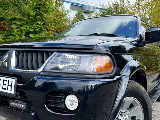 Черный Мицубиси Паджеро Спорт, объемом двигателя 3 л и пробегом 191 тыс. км за 7999 $, фото 7 на Automoto.ua