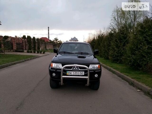 Черный Мицубиси Паджеро Спорт, объемом двигателя 2.5 л и пробегом 264 тыс. км за 11200 $, фото 2 на Automoto.ua