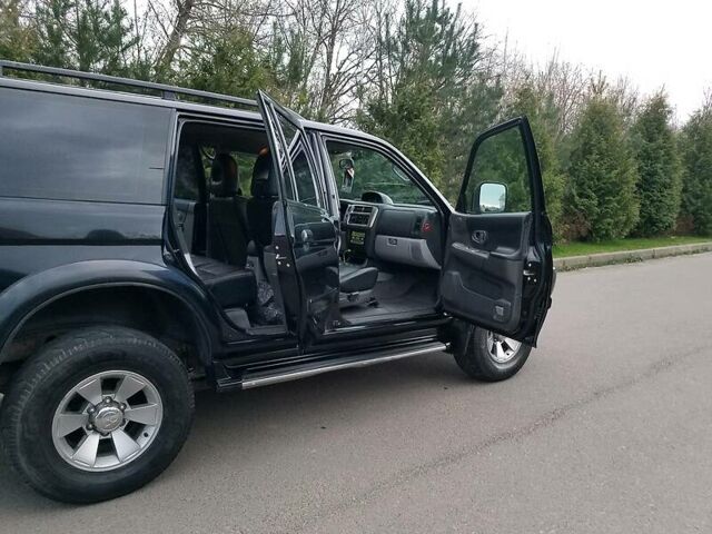 Черный Мицубиси Паджеро Спорт, объемом двигателя 2.5 л и пробегом 264 тыс. км за 11200 $, фото 12 на Automoto.ua