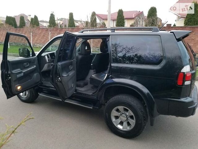 Черный Мицубиси Паджеро Спорт, объемом двигателя 2.5 л и пробегом 264 тыс. км за 11200 $, фото 13 на Automoto.ua