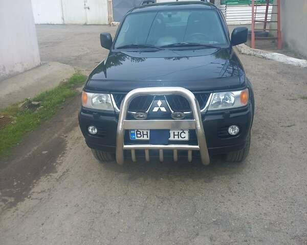 Черный Мицубиси Паджеро Спорт, объемом двигателя 3 л и пробегом 213 тыс. км за 8500 $, фото 1 на Automoto.ua
