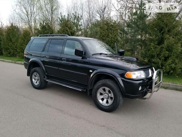 Черный Мицубиси Паджеро Спорт, объемом двигателя 2.5 л и пробегом 264 тыс. км за 11200 $, фото 9 на Automoto.ua
