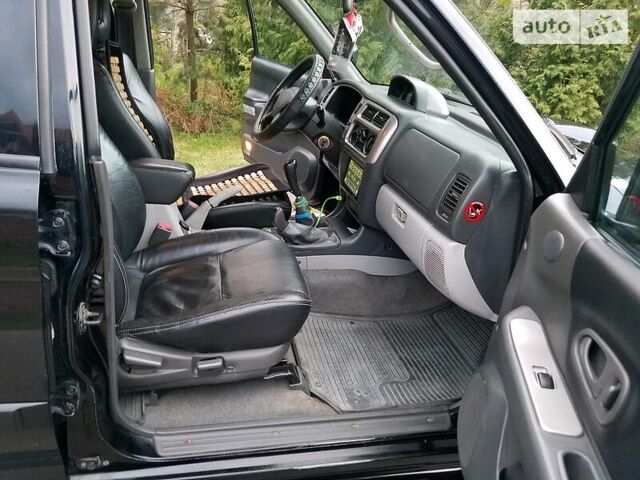 Черный Мицубиси Паджеро Спорт, объемом двигателя 2.5 л и пробегом 264 тыс. км за 11200 $, фото 10 на Automoto.ua