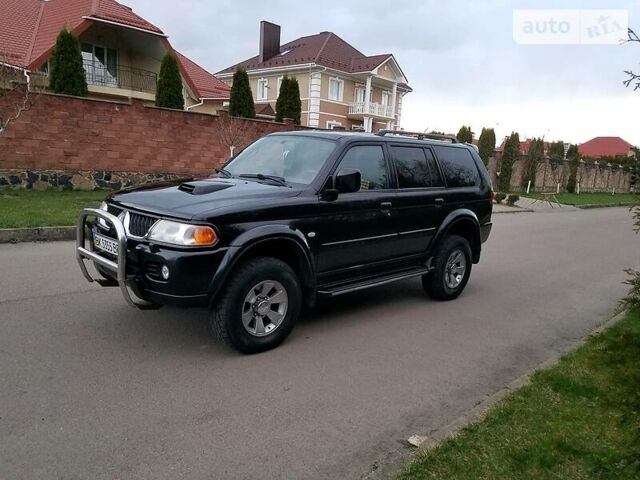 Черный Мицубиси Паджеро Спорт, объемом двигателя 2.5 л и пробегом 264 тыс. км за 11200 $, фото 4 на Automoto.ua