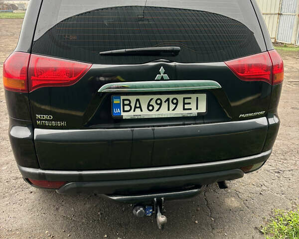 Черный Мицубиси Паджеро Спорт, объемом двигателя 2.5 л и пробегом 316 тыс. км за 10400 $, фото 2 на Automoto.ua