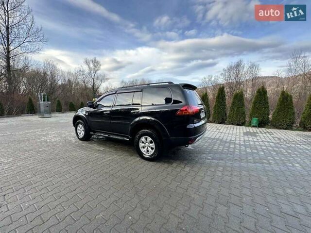 Чорний Міцубісі Паджеро Спорт, об'ємом двигуна 2.48 л та пробігом 245 тис. км за 12500 $, фото 10 на Automoto.ua