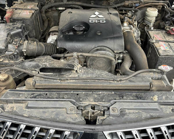 Черный Мицубиси Паджеро Спорт, объемом двигателя 2.5 л и пробегом 316 тыс. км за 10400 $, фото 14 на Automoto.ua