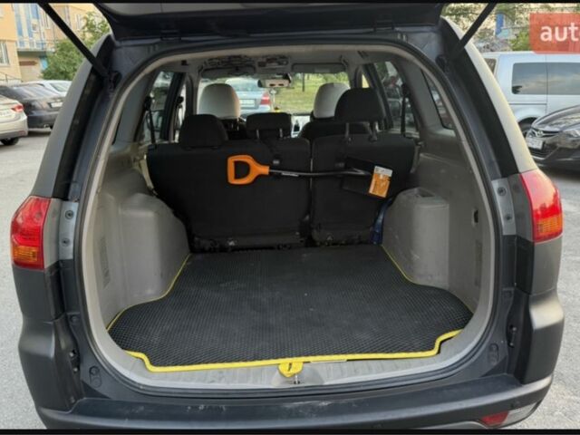 Чорний Міцубісі Паджеро Спорт, об'ємом двигуна 2.5 л та пробігом 250 тис. км за 14000 $, фото 5 на Automoto.ua