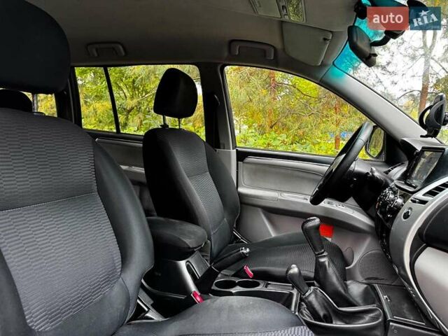 Мицубиси Паджеро Спорт 2010 в Киеве на Automoto.ua Черный Мицубиси Паджеро Спорт, объемом двигателя 2.5 л и пробегом 334 тыс. км за 13790 $, фото 31 на Automoto.ua