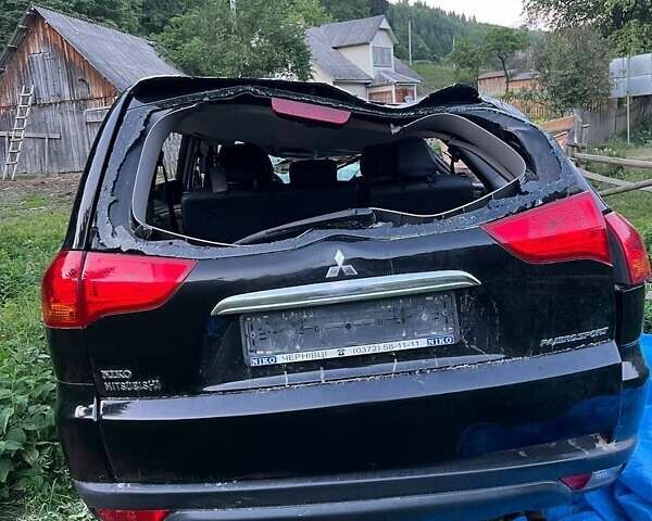 Чорний Міцубісі Паджеро Спорт, об'ємом двигуна 2.5 л та пробігом 128 тис. км за 5300 $, фото 1 на Automoto.ua