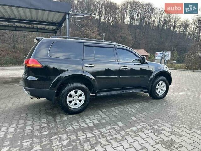 Чорний Міцубісі Паджеро Спорт, об'ємом двигуна 2.48 л та пробігом 245 тис. км за 12500 $, фото 11 на Automoto.ua