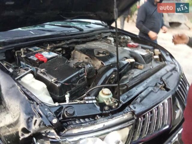 Чорний Міцубісі Паджеро Спорт, об'ємом двигуна 2.5 л та пробігом 128 тис. км за 5300 $, фото 5 на Automoto.ua