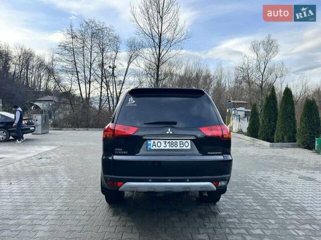 Чорний Міцубісі Паджеро Спорт, об'ємом двигуна 2.48 л та пробігом 245 тис. км за 12500 $, фото 9 на Automoto.ua