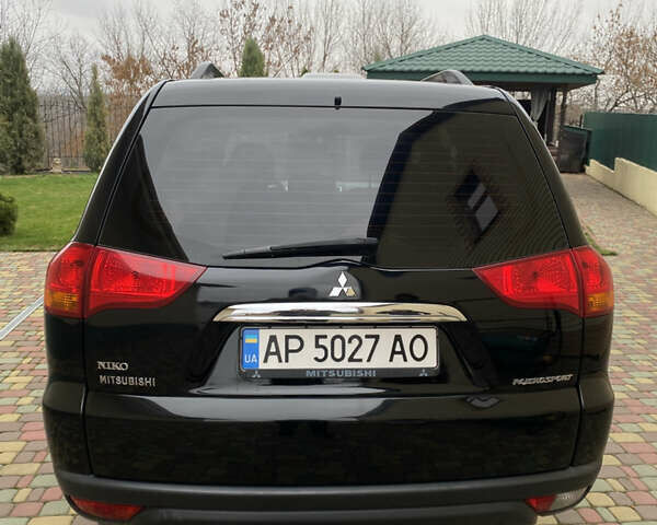 Черный Мицубиси Паджеро Спорт, объемом двигателя 2.5 л и пробегом 154 тыс. км за 13850 $, фото 5 на Automoto.ua