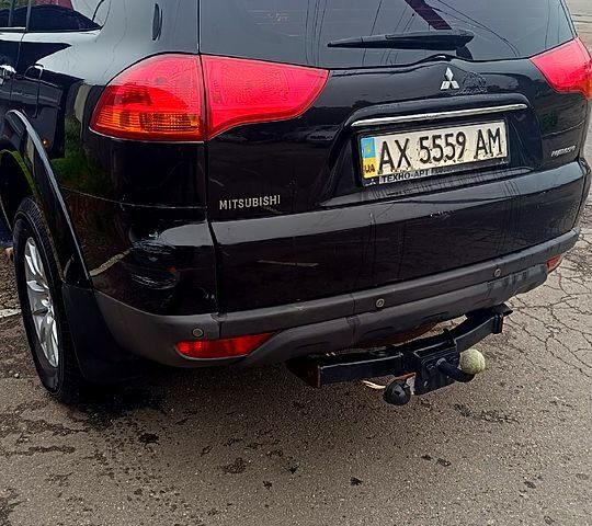 Чорний Міцубісі Паджеро Спорт, об'ємом двигуна 3 л та пробігом 186 тис. км за 10500 $, фото 13 на Automoto.ua