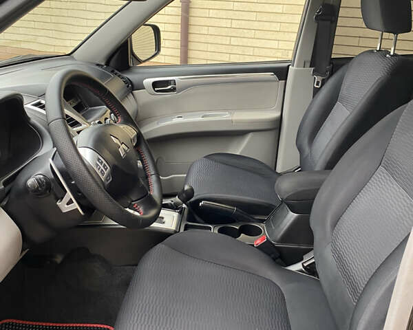 Черный Мицубиси Паджеро Спорт, объемом двигателя 2.5 л и пробегом 154 тыс. км за 13850 $, фото 38 на Automoto.ua