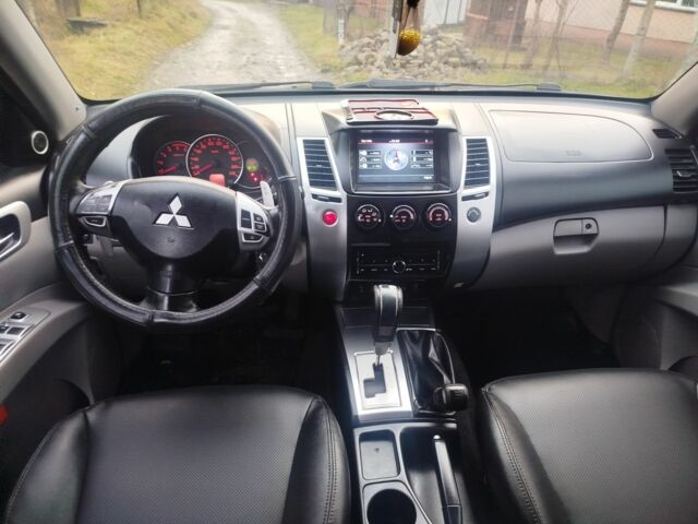 Черный Мицубиси Паджеро Спорт, объемом двигателя 2.5 л и пробегом 240 тыс. км за 12650 $, фото 5 на Automoto.ua