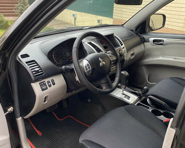 Черный Мицубиси Паджеро Спорт, объемом двигателя 2.5 л и пробегом 154 тыс. км за 13850 $, фото 37 на Automoto.ua