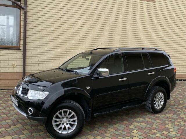 Черный Мицубиси Паджеро Спорт, объемом двигателя 2.5 л и пробегом 154 тыс. км за 13850 $, фото 1 на Automoto.ua