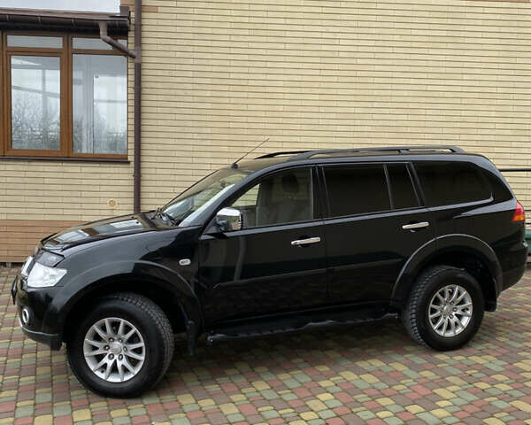 Черный Мицубиси Паджеро Спорт, объемом двигателя 2.5 л и пробегом 154 тыс. км за 13850 $, фото 2 на Automoto.ua