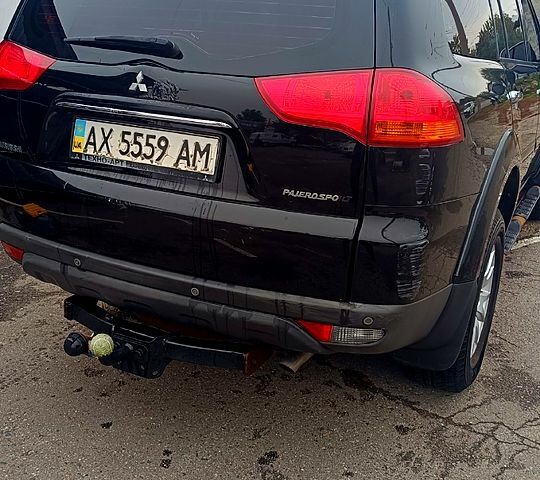 Чорний Міцубісі Паджеро Спорт, об'ємом двигуна 3 л та пробігом 186 тис. км за 10500 $, фото 4 на Automoto.ua