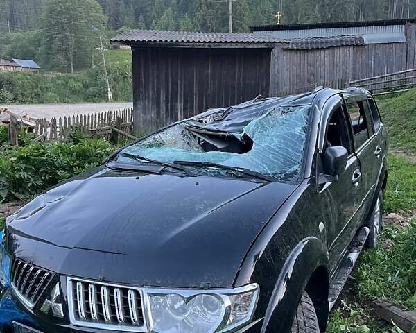 Чорний Міцубісі Паджеро Спорт, об'ємом двигуна 2.5 л та пробігом 128 тис. км за 5300 $, фото 4 на Automoto.ua