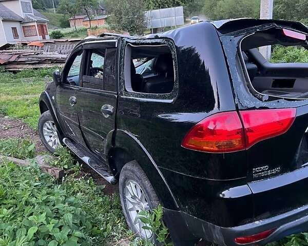 Чорний Міцубісі Паджеро Спорт, об'ємом двигуна 2.5 л та пробігом 128 тис. км за 5300 $, фото 2 на Automoto.ua