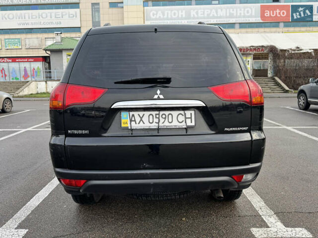 Черный Мицубиси Паджеро Спорт, объемом двигателя 2.5 л и пробегом 219 тыс. км за 12000 $, фото 6 на Automoto.ua