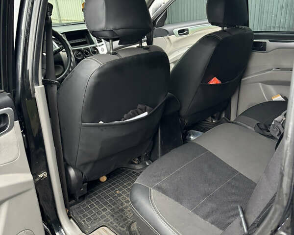 Черный Мицубиси Паджеро Спорт, объемом двигателя 2.5 л и пробегом 316 тыс. км за 10400 $, фото 10 на Automoto.ua