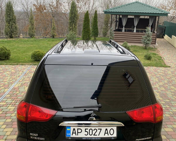 Черный Мицубиси Паджеро Спорт, объемом двигателя 2.5 л и пробегом 154 тыс. км за 13850 $, фото 21 на Automoto.ua