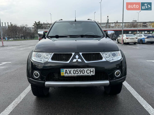 Черный Мицубиси Паджеро Спорт, объемом двигателя 2.5 л и пробегом 219 тыс. км за 12000 $, фото 7 на Automoto.ua