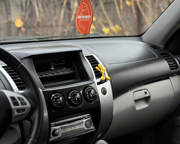 Черный Мицубиси Паджеро Спорт, объемом двигателя 2.5 л и пробегом 219 тыс. км за 12200 $, фото 62 на Automoto.ua