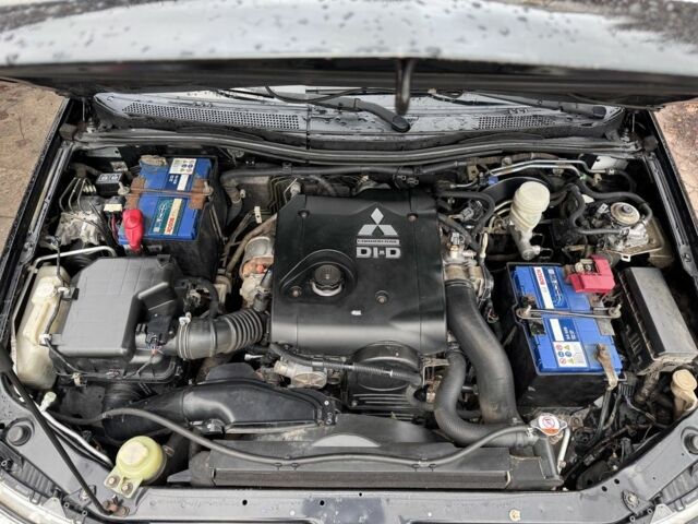 Черный Мицубиси Паджеро Спорт, объемом двигателя 2.5 л и пробегом 219 тыс. км за 12200 $, фото 10 на Automoto.ua