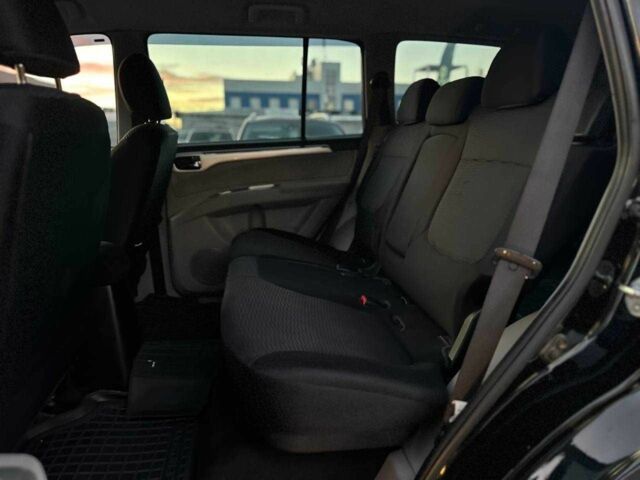 Чорний Міцубісі Паджеро Спорт, об'ємом двигуна 2.5 л та пробігом 197 тис. км за 12990 $, фото 13 на Automoto.ua