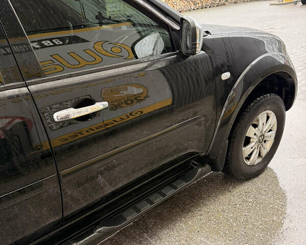 Чорний Міцубісі Паджеро Спорт, об'ємом двигуна 2.48 л та пробігом 225 тис. км за 14799 $, фото 4 на Automoto.ua