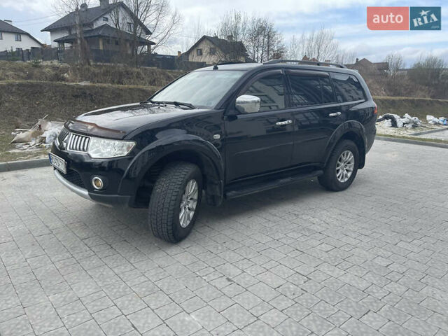 Черный Мицубиси Паджеро Спорт, объемом двигателя 2.48 л и пробегом 221 тыс. км за 15000 $, фото 1 на Automoto.ua