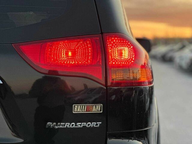 Чорний Міцубісі Паджеро Спорт, об'ємом двигуна 2.5 л та пробігом 197 тис. км за 12990 $, фото 7 на Automoto.ua