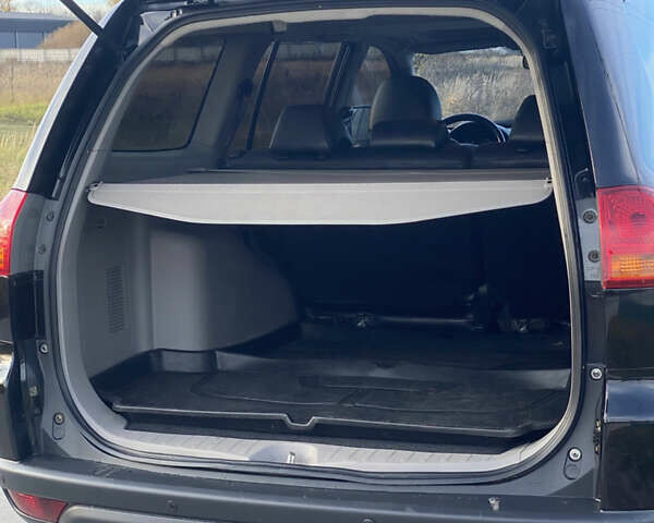 Чорний Міцубісі Паджеро Спорт, об'ємом двигуна 3 л та пробігом 255 тис. км за 12900 $, фото 13 на Automoto.ua