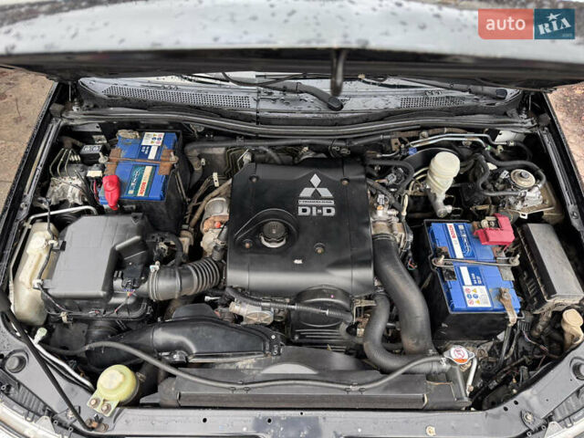 Черный Мицубиси Паджеро Спорт, объемом двигателя 2.5 л и пробегом 219 тыс. км за 12200 $, фото 20 на Automoto.ua