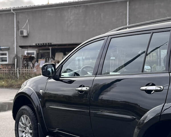 Черный Мицубиси Паджеро Спорт, объемом двигателя 2.5 л и пробегом 219 тыс. км за 12200 $, фото 4 на Automoto.ua