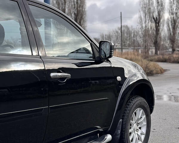 Черный Мицубиси Паджеро Спорт, объемом двигателя 2.5 л и пробегом 219 тыс. км за 12200 $, фото 13 на Automoto.ua