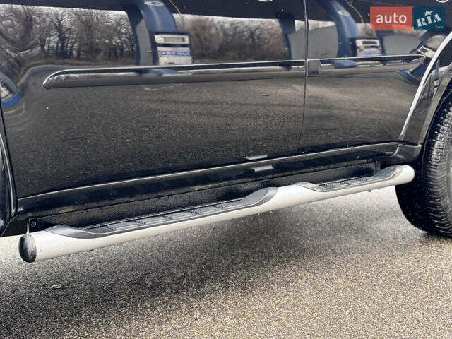 Черный Мицубиси Паджеро Спорт, объемом двигателя 2.5 л и пробегом 219 тыс. км за 12200 $, фото 90 на Automoto.ua