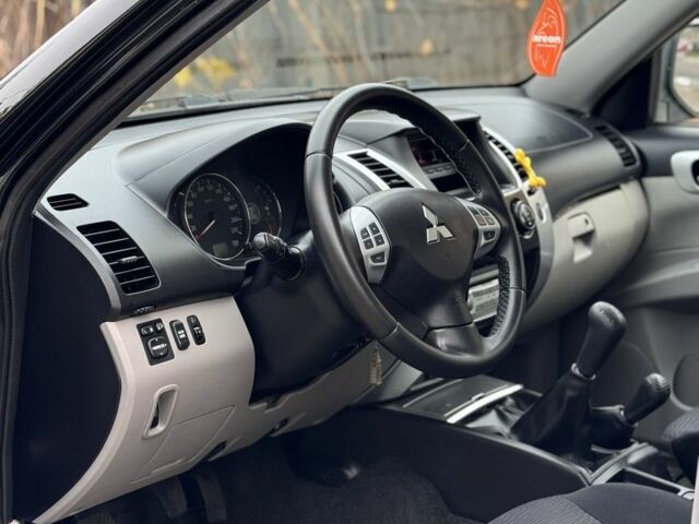 Черный Мицубиси Паджеро Спорт, объемом двигателя 2.5 л и пробегом 219 тыс. км за 12200 $, фото 11 на Automoto.ua